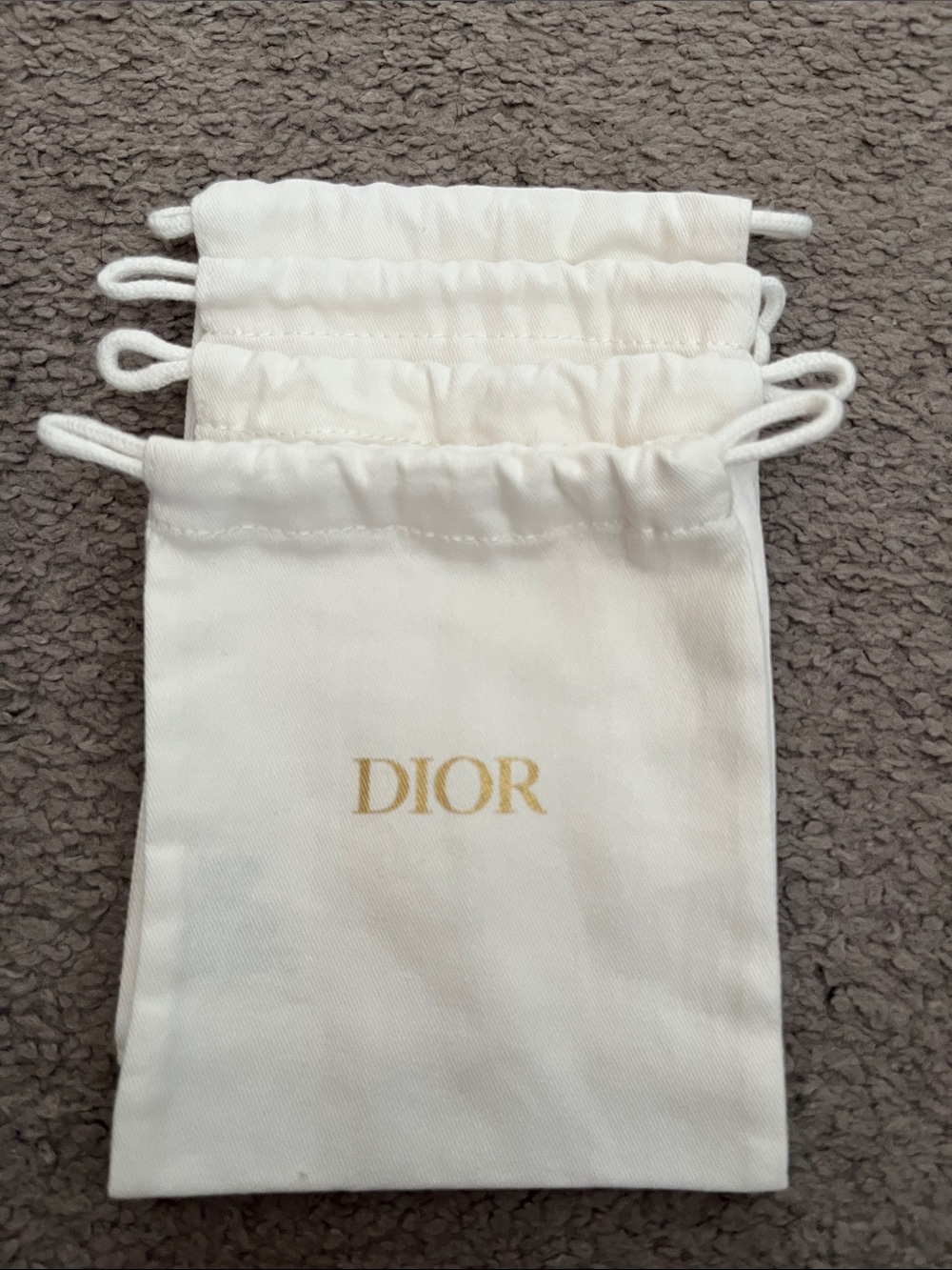 Dior Ivory trinket bags x 4